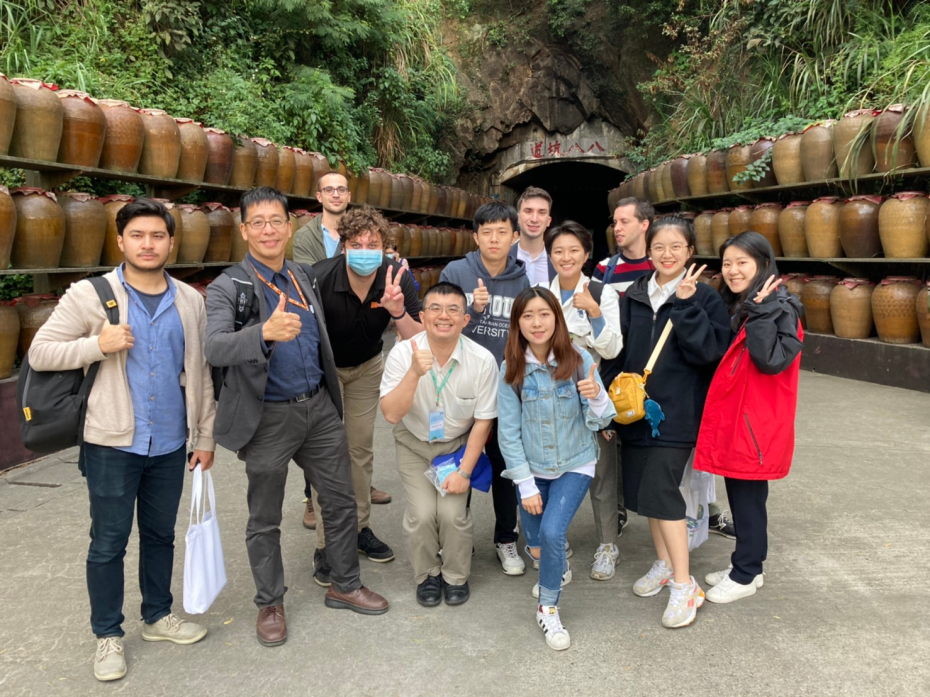 ll participants in front of Tunnel 88, which is now used for aging Kaoliang.